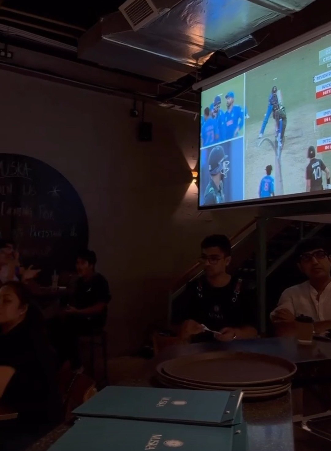 Cricket match screened on the big screen at Muska KL